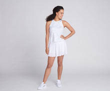 Load image into Gallery viewer, woman wearing white printed shirt and white pleated tennis skirt